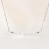 Moonstone Bar Necklace displayed on a mannequin with a minimalist sterling silver chain and faceted moonstone beads