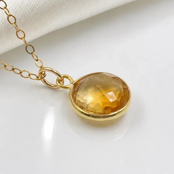 Citrine Pendant Necklace close-up showing natural citrine gemstone Citrine Necklace with 24K gold plated bezel and gold filled chain Handcrafted Citrine Pendant Necklace made in Spain