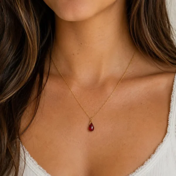 Close-up of natural Garnet gemstone pendant in Gold Filled or Sterling Silver