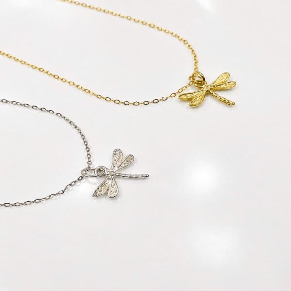Minimalist Gold Dragonfly Pendant Showing Nature‑Inspired Design 18K Gold Plated Dragonfly Charm with Polished Finish Sterling Silver Dragonfly Pendant Plated in 18K Gold – Texture Detail