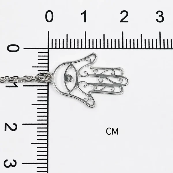 Close-up of sterling silver Hamsa pendant showing minimalist 925 silver detailing