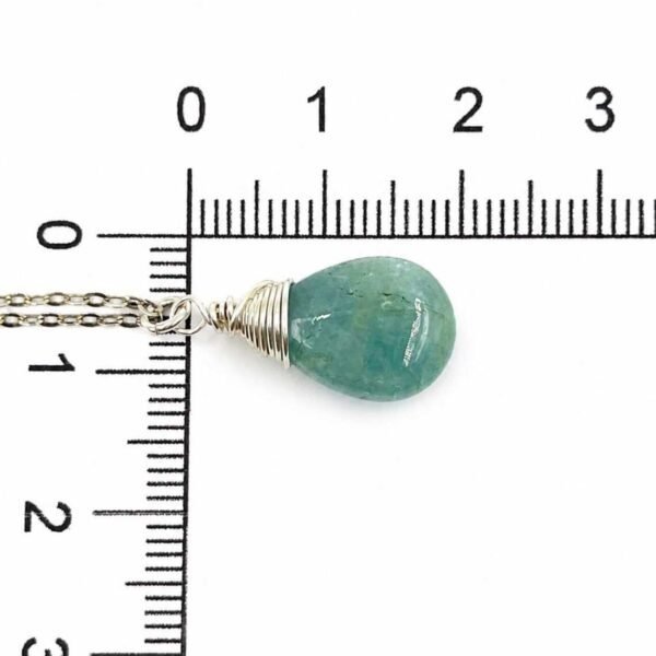 Aquamarine necklace detail shot showing natural raw gemstone clarity