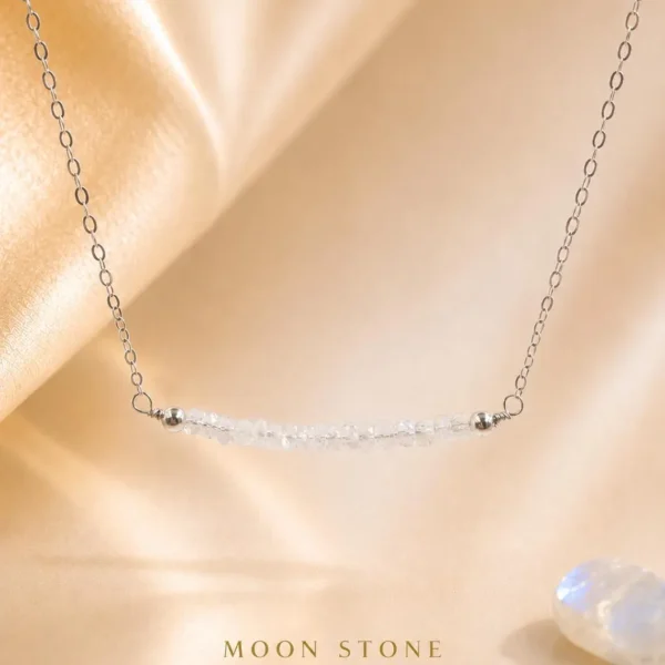 Close-up of faceted moonstone bar pendant on a delicate sterling silver chain