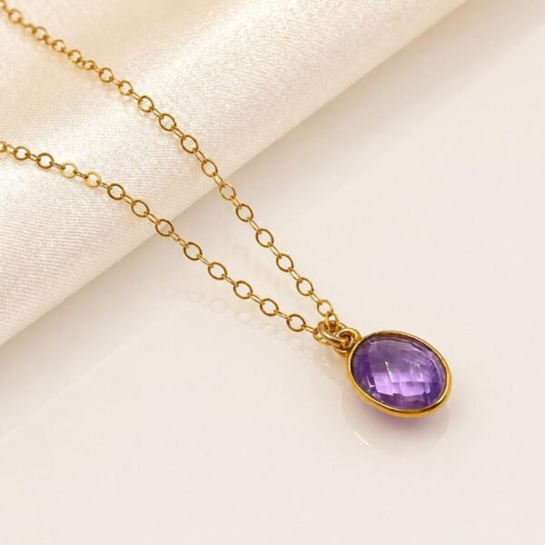 Close-up of natural Amethyst gemstone showing purple tones and faceted details