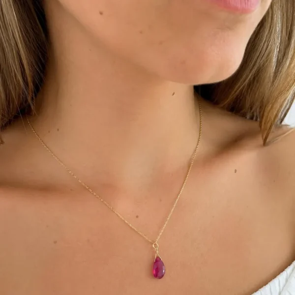 Minimalist Garnet pendant necklace showing deep red natural gemstone tones