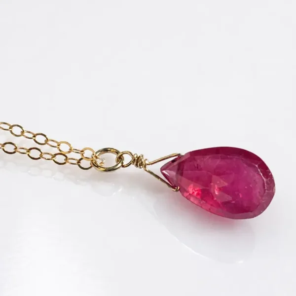 Close-up of natural Garnet gemstone pendant in Gold Filled or Sterling Silver