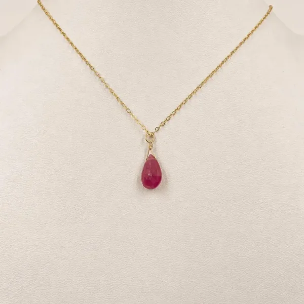 Minimalist Garnet pendant necklace showing deep red natural gemstone tones