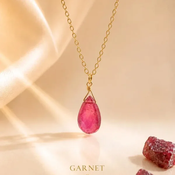 Minimalist Garnet pendant necklace showing deep red natural gemstone tones